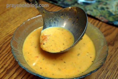 fresh tomato soup ladled