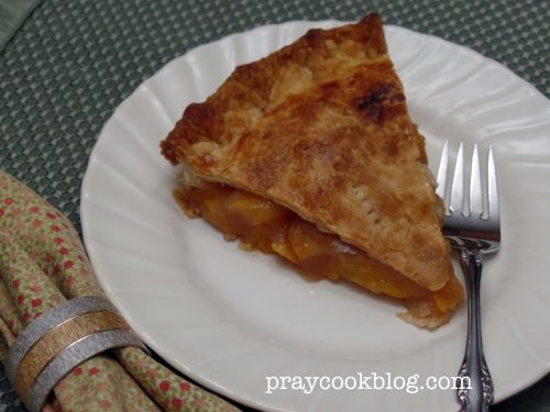 Peach pie single with napkin